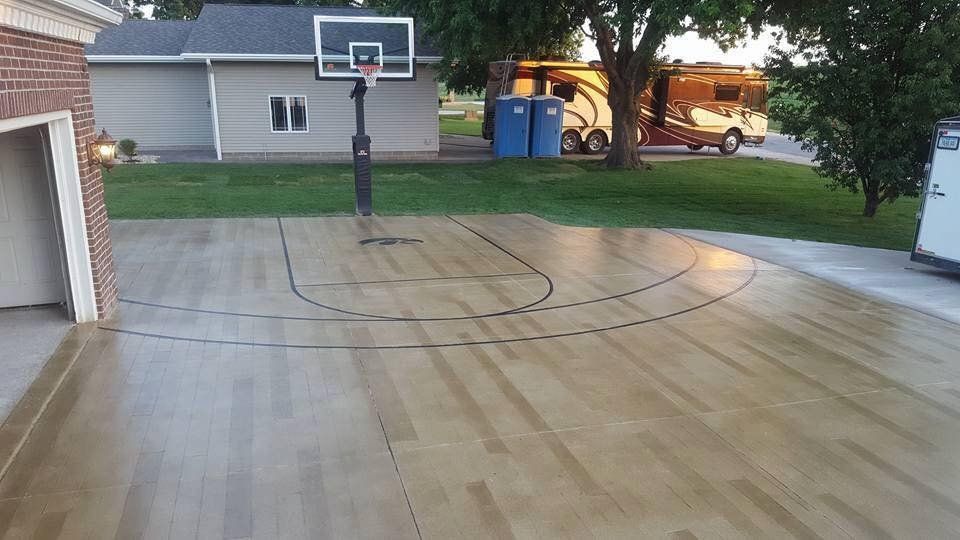 Basketball court in front of house