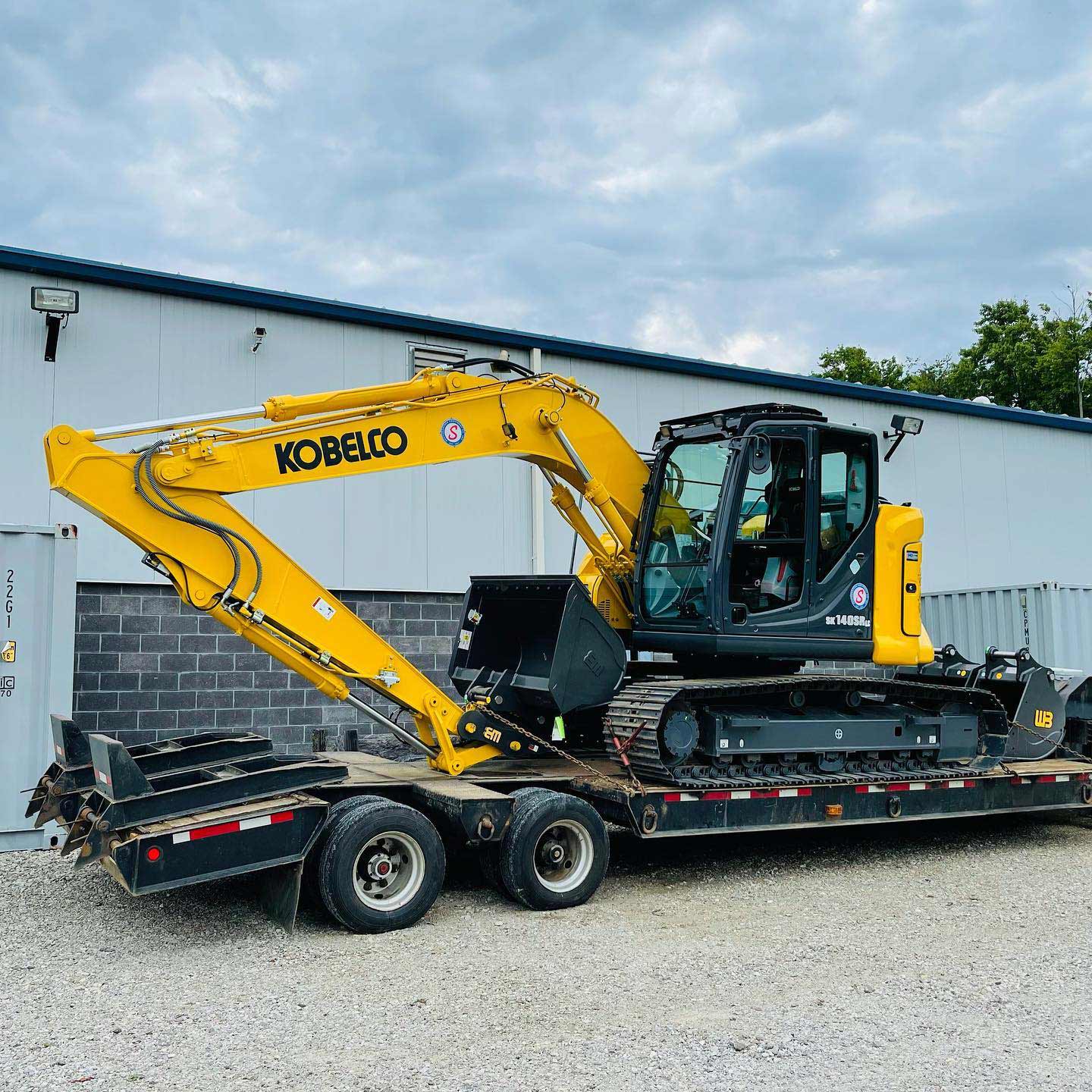 Yellow excavator — Massillon, OH — Bachtel Excavating Inc.