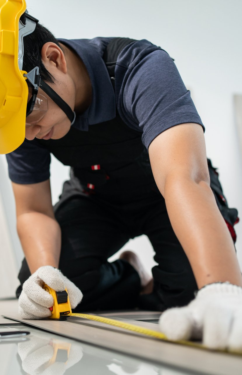 a man installing laminate floors
