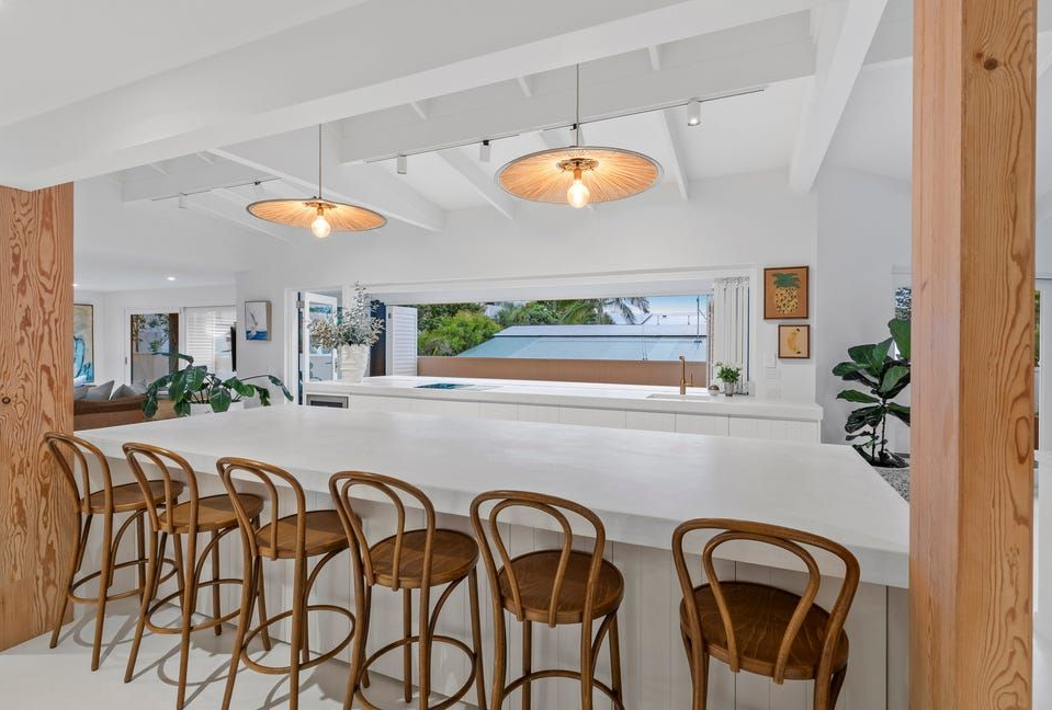 Bright White Bar With Wooden Stools and in a Modern Open Kitchen-café Space — Greg Pollard Building in Terranora, NSW