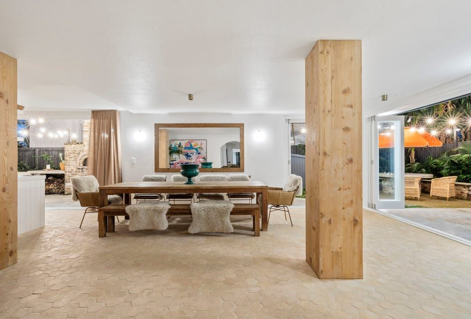 Spacious Modern Dining Room With Wooden Table, Benches — Greg Pollard Building in Kingscliff, NSW