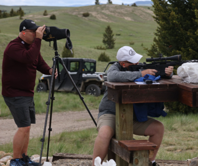 A man taking a picture of another man with a camera