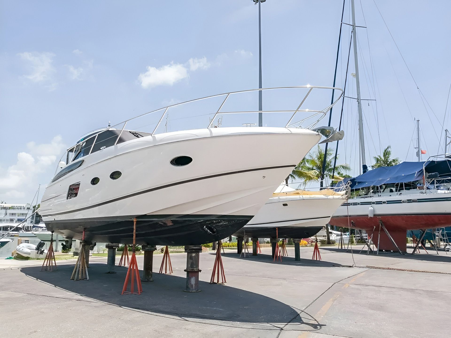 A Boat is Sitting on Stilts in a Marina — Mackay Marine Services in Mackay, QLD
