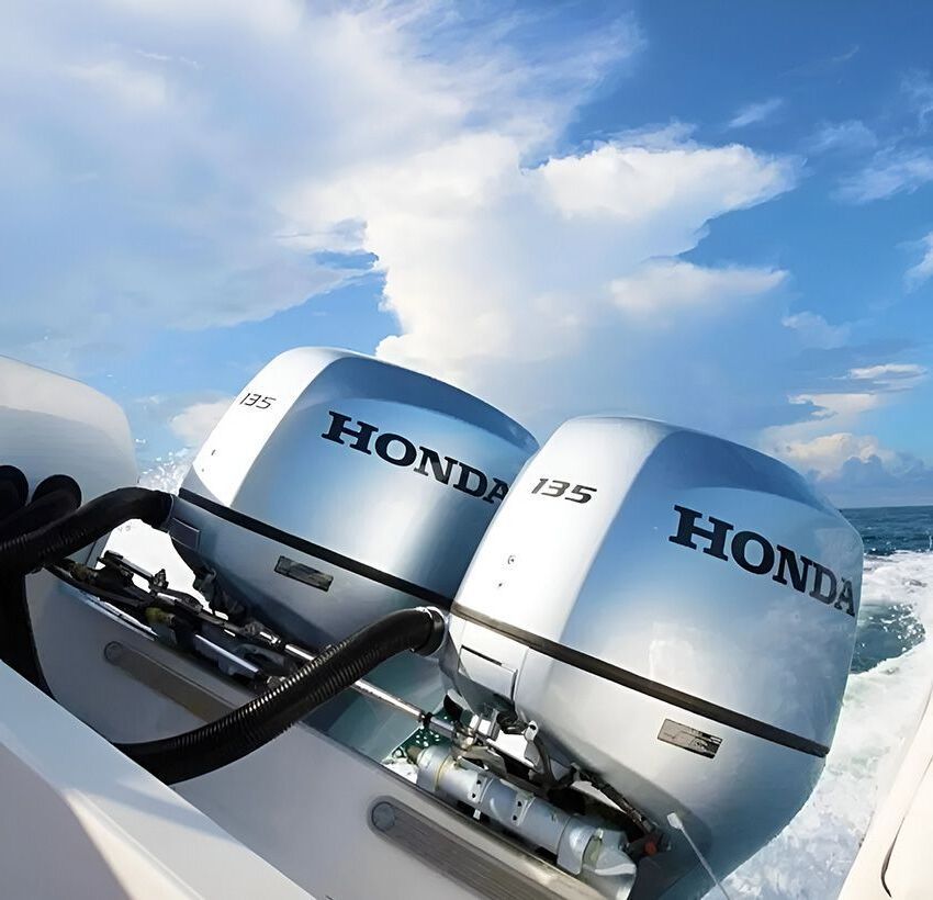 Two Honda Outboard Motors on a Boat in the Ocean ā Mackay Marine Services in Mackay, QLD