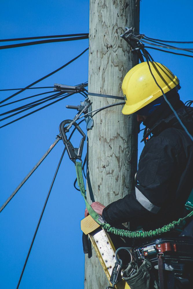 Electrician Working On An Electric Wiring — Electrical Services in Turvey Park, NSW