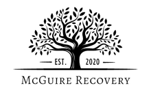 The logo for mcguire recovery has a tree with leaves on it.