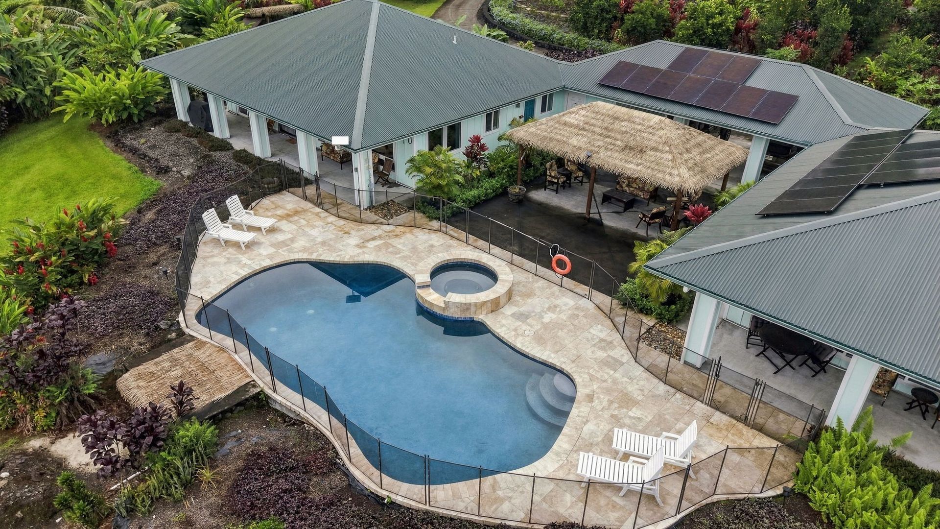 Aerial view of the shared pool and hot tub between Koili Point’s two homes.