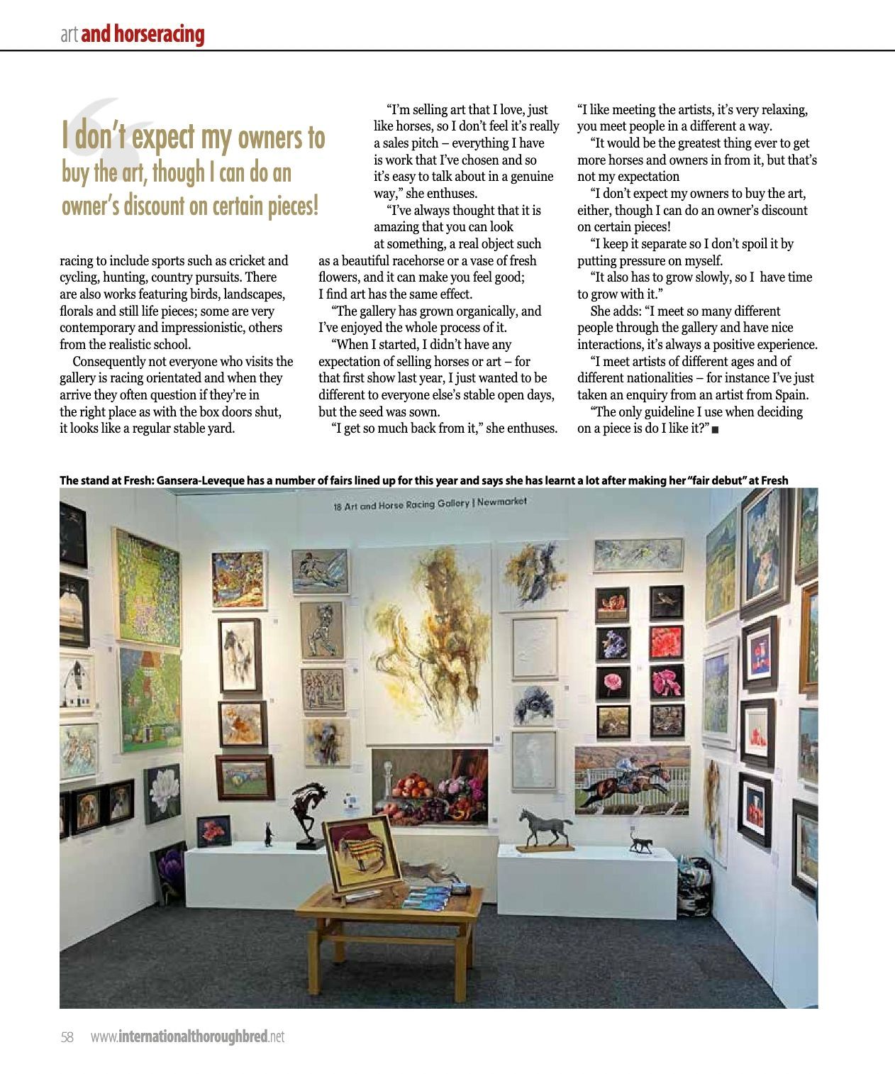 A room filled with lots of paintings and a table.