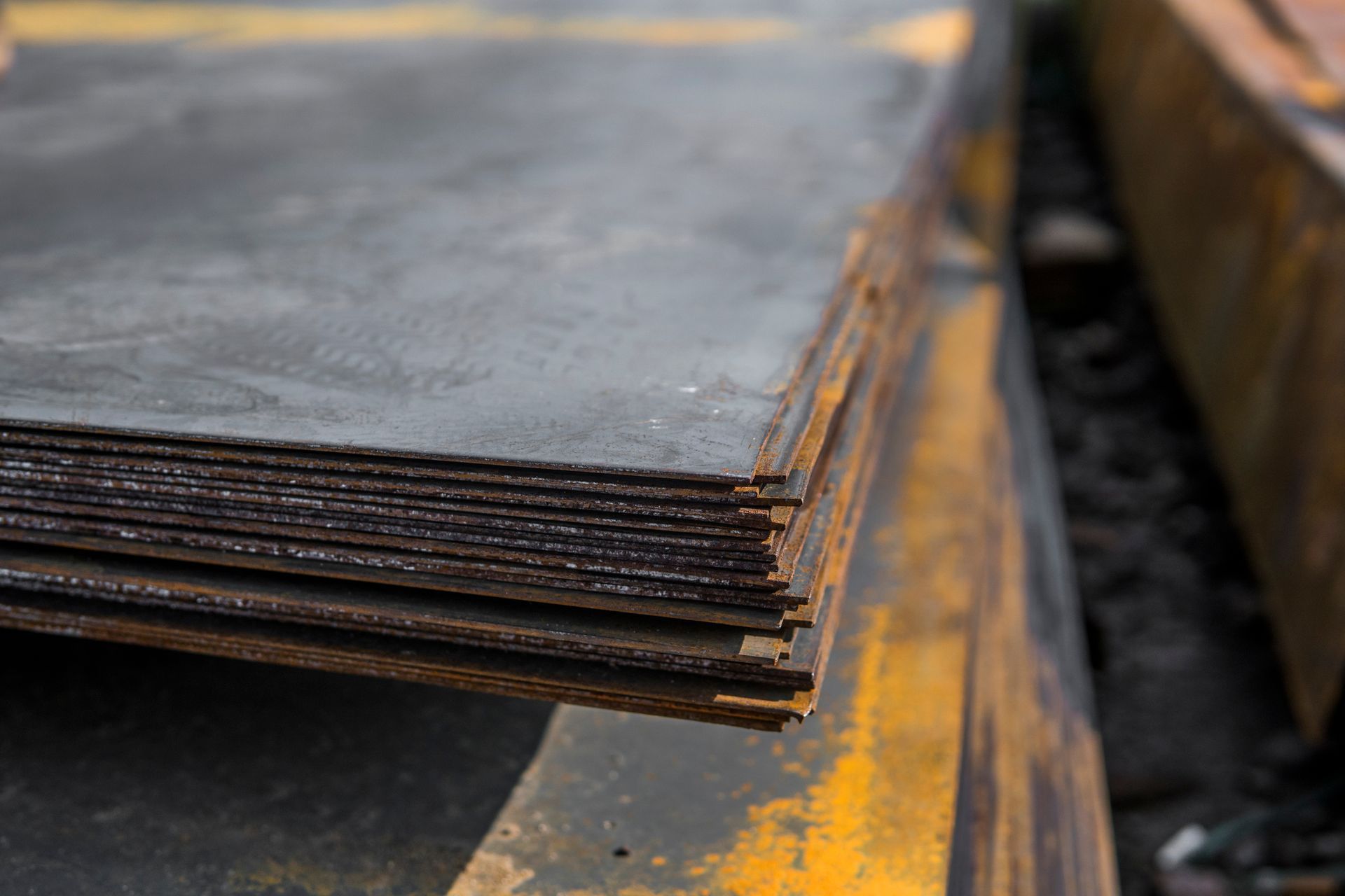 Stack of rusty steel sheets.