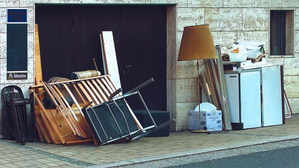 residential junk needing to be collected in dumpster rental