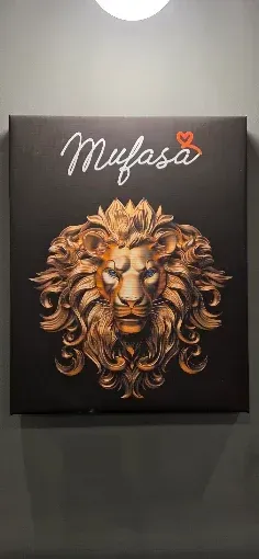 Quadro nero da parete raffigurante una testa di leone con la scritta