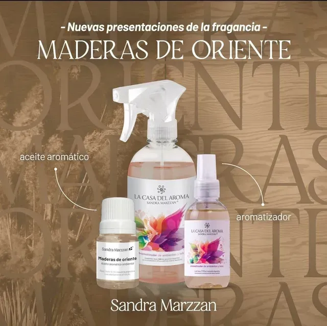 Exhibición promocional de fragancias y aceites aromáticos “Maderas de Oriente” de Sandra Marzzan sobre un fondo beige