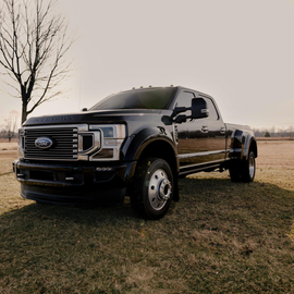 A black Ford F series truck.
