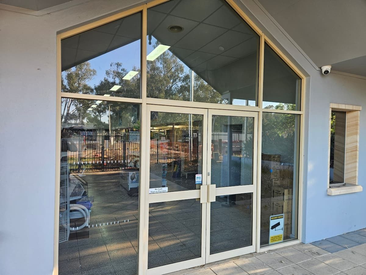 Glass Double Doors and Windows on A Building Entrance — On Point Detailing Wagga in East Wagga Wagga, NSW