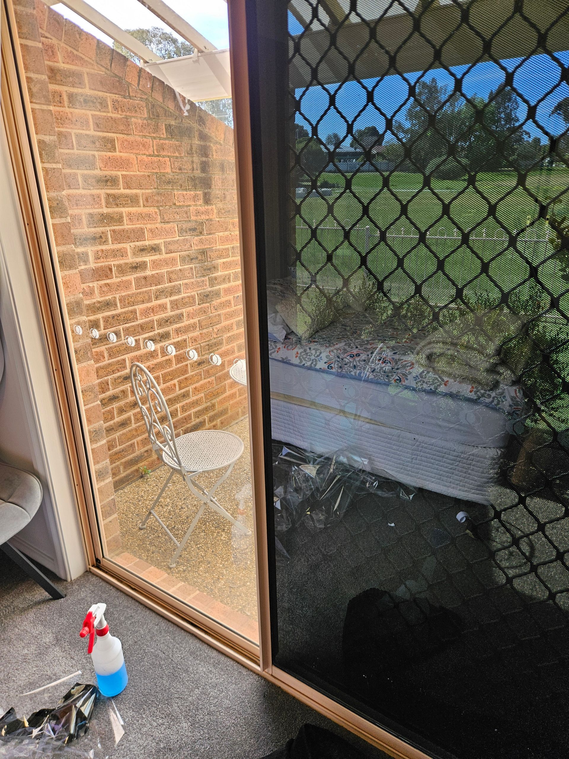 House Exterior With a Window, Reflected Fence, and an Air Conditioner — On Point Detailing Wagga in East Wagga Wagga, NSW