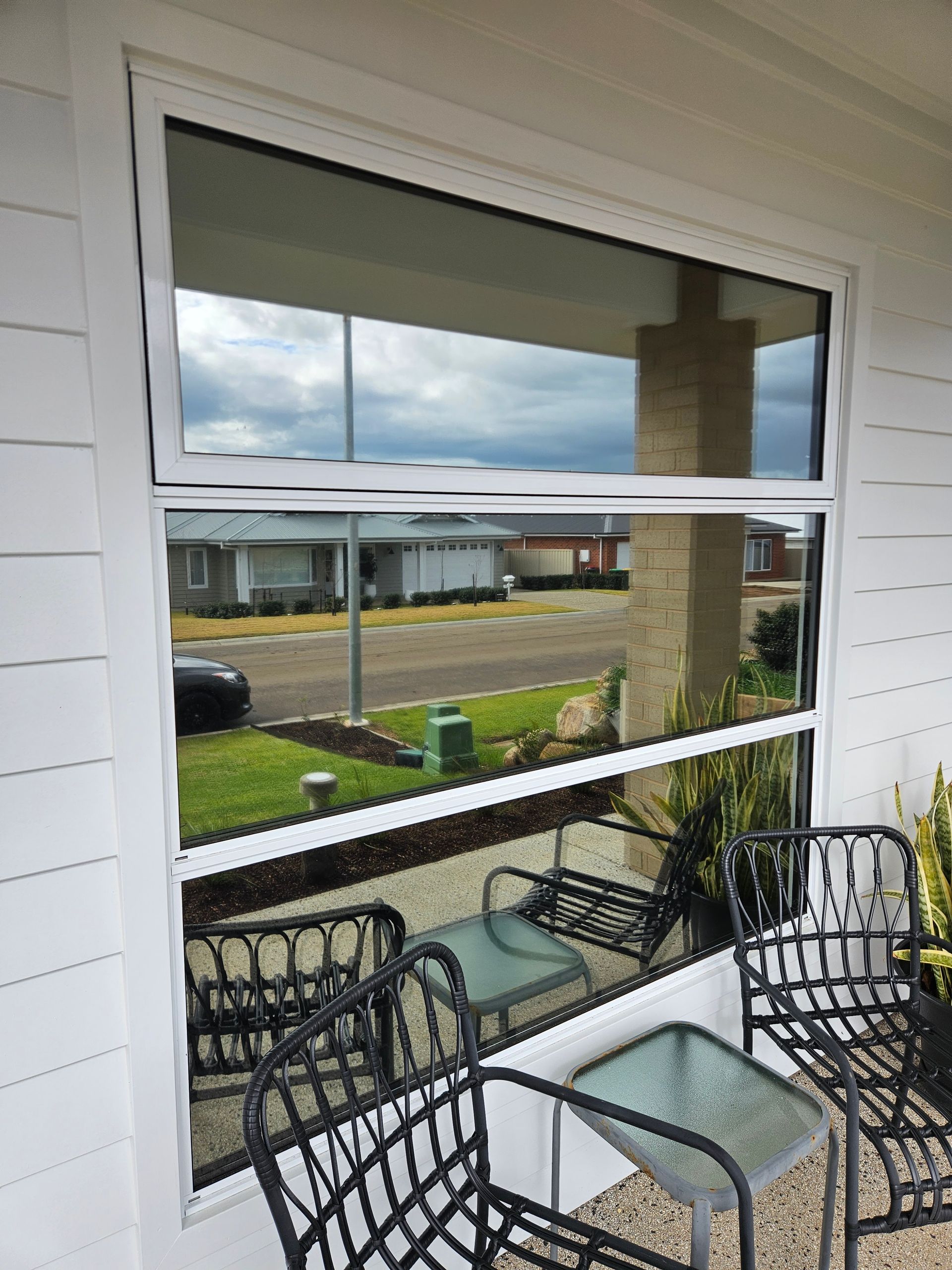 Porch Chairs and Glass Table Beside a White House Window — On Point Detailing Wagga in East Wagga Wagga, NSW