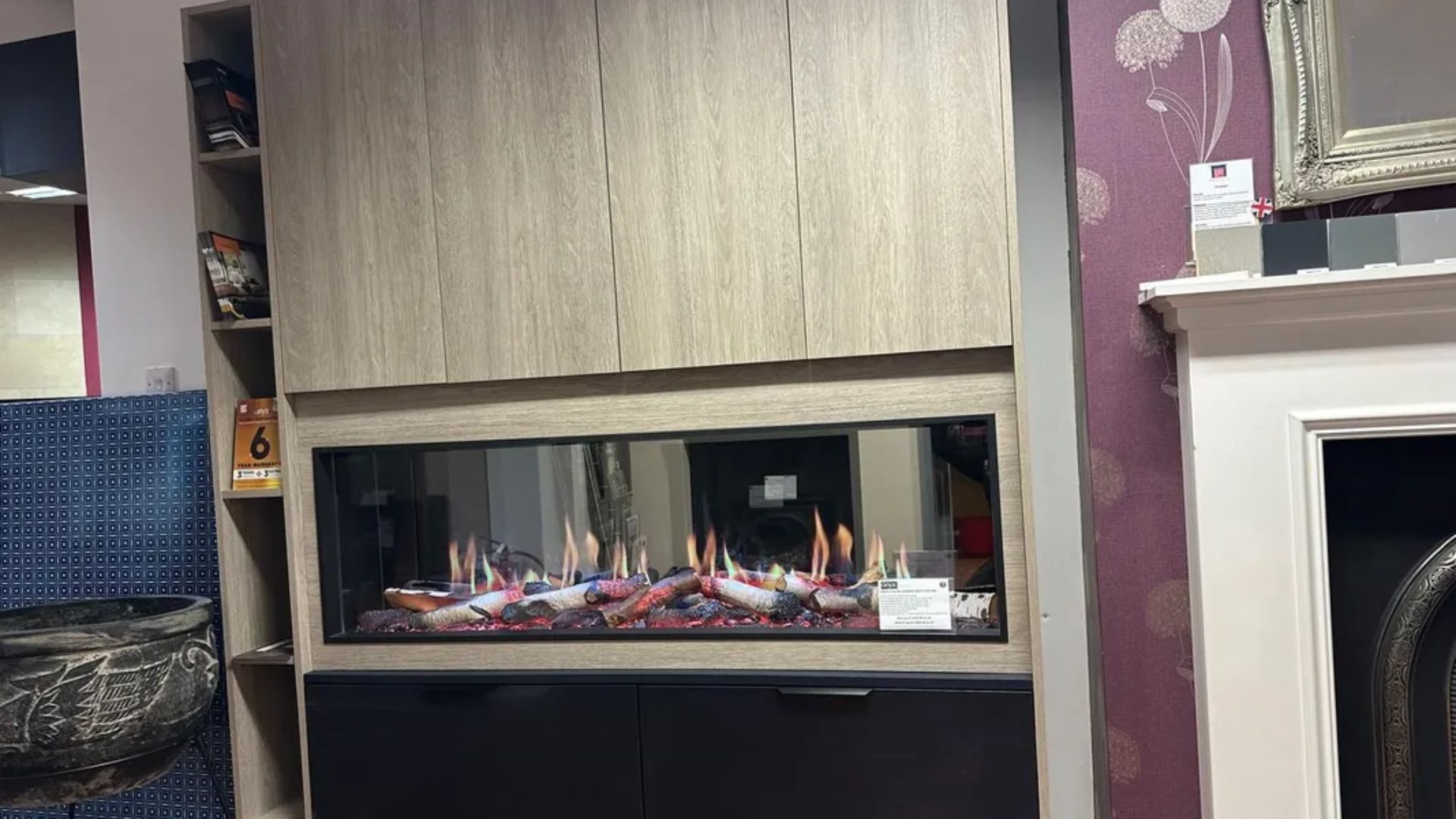 Media walls with electric fires
