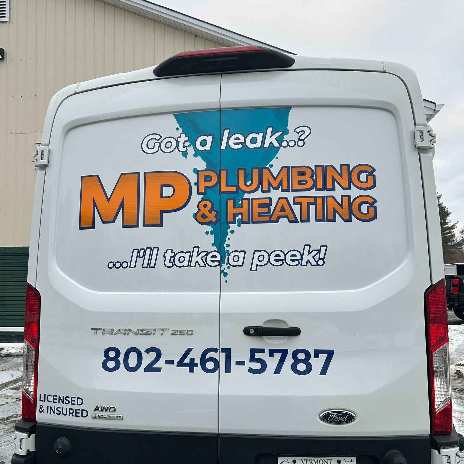 A commercial vehicle featuring a professional wrap and decals.