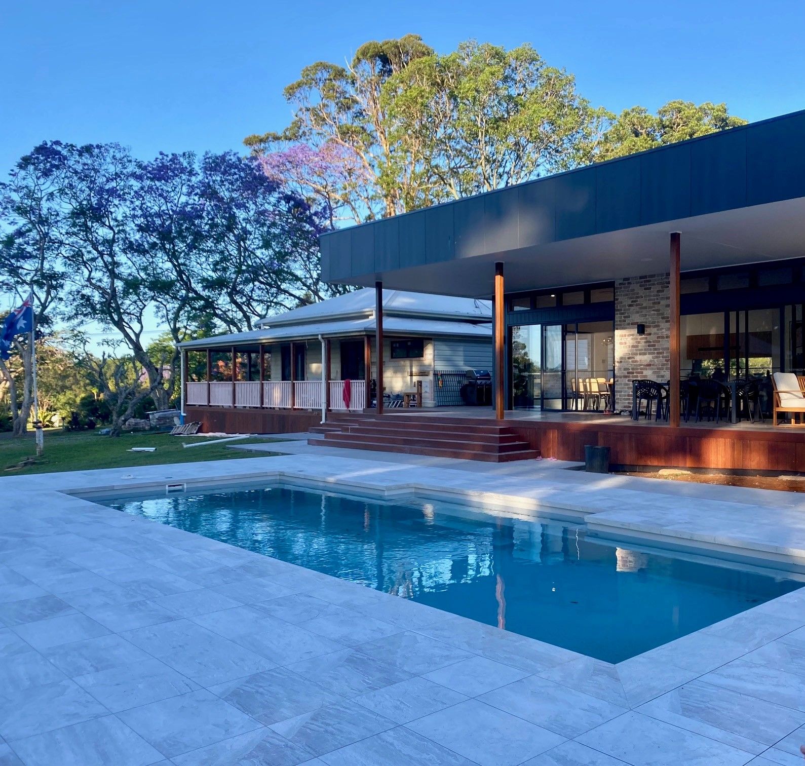 A house surrounded by pool area — Bloomscapes in Lennox Head NSW