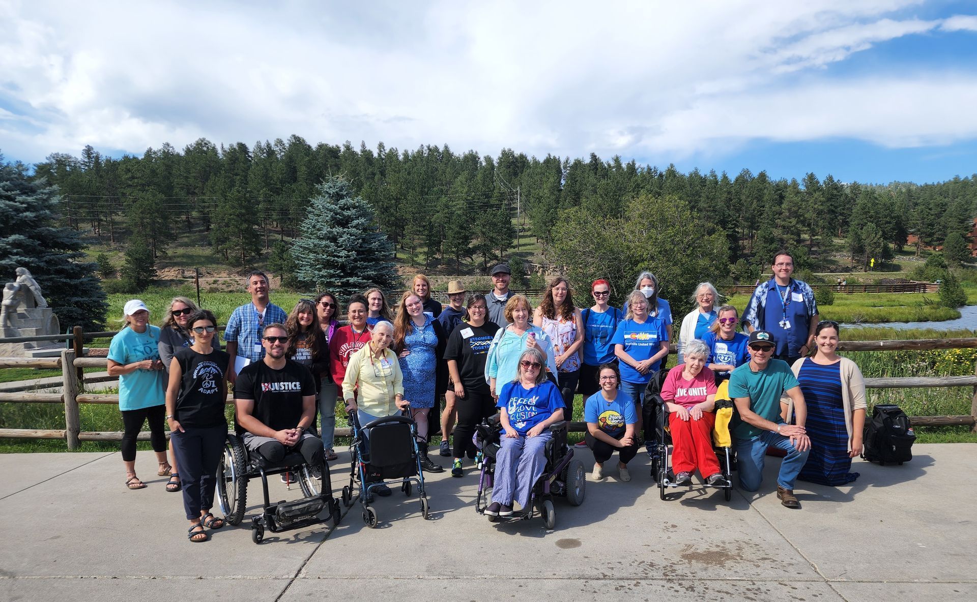 Center for People with Disabilities participants and staff gathered outdoors