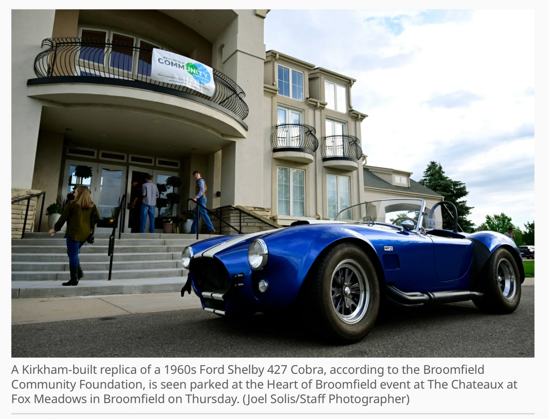 Broomfield Enterprise photo and caption: a replica 1960s Ford Shelby Cobra, the Legacy Fund sweepstakes prize, parked at the Heart of Broomfield event