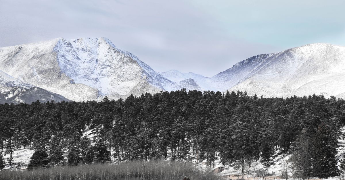 Snowy Colorado mountains at sunrise