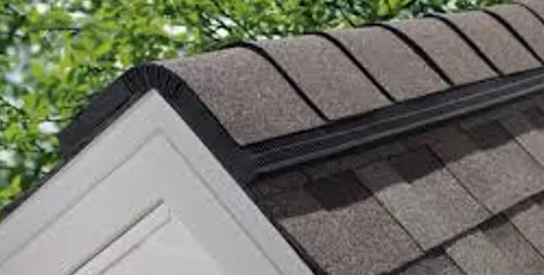 A close up of a roof with shingles on it.