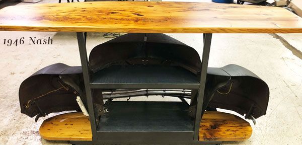 A wooden table with the year 1946 nash on it