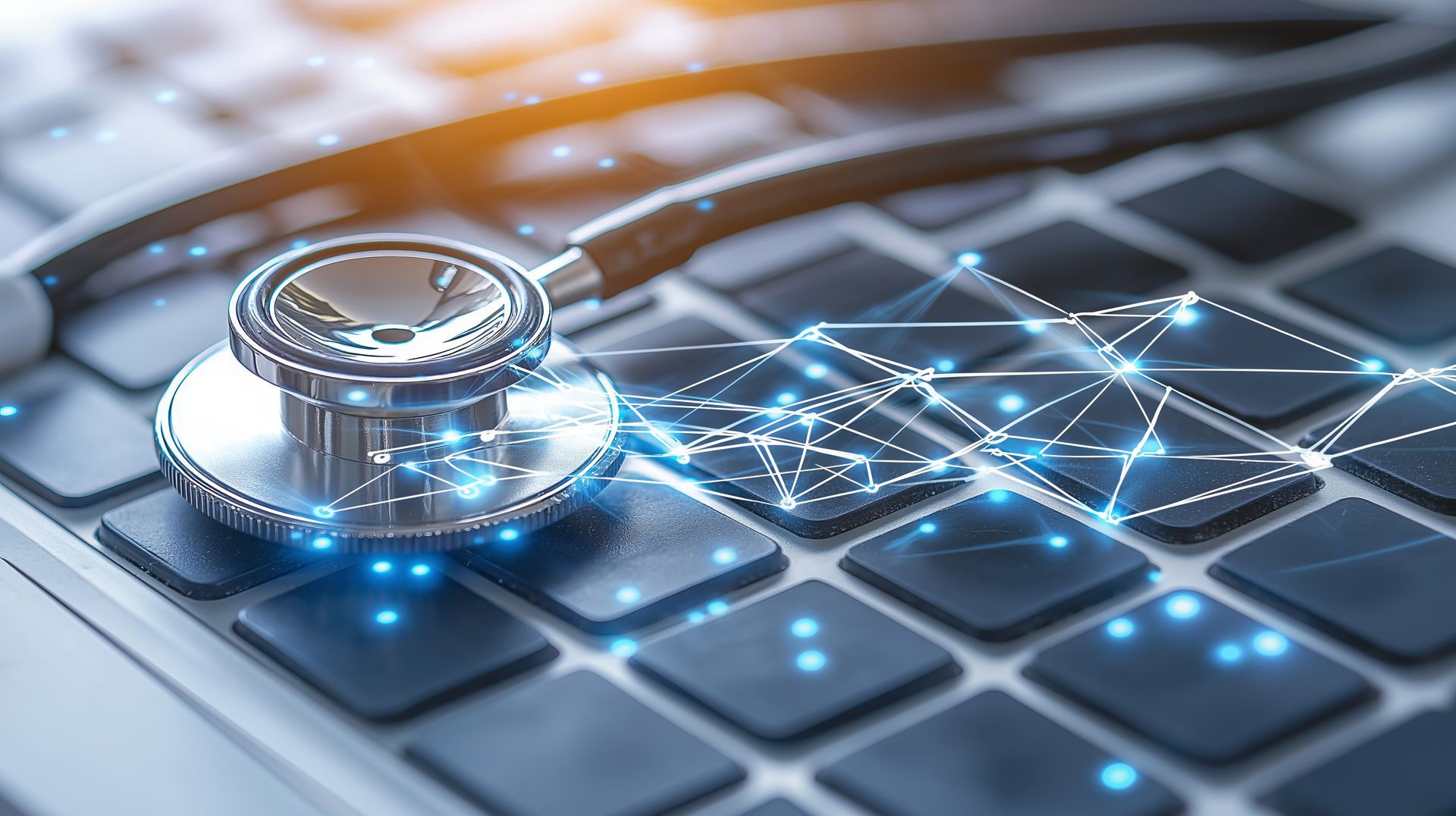 Stethoscope on a laptop keyboard with glowing digital network overlay.
