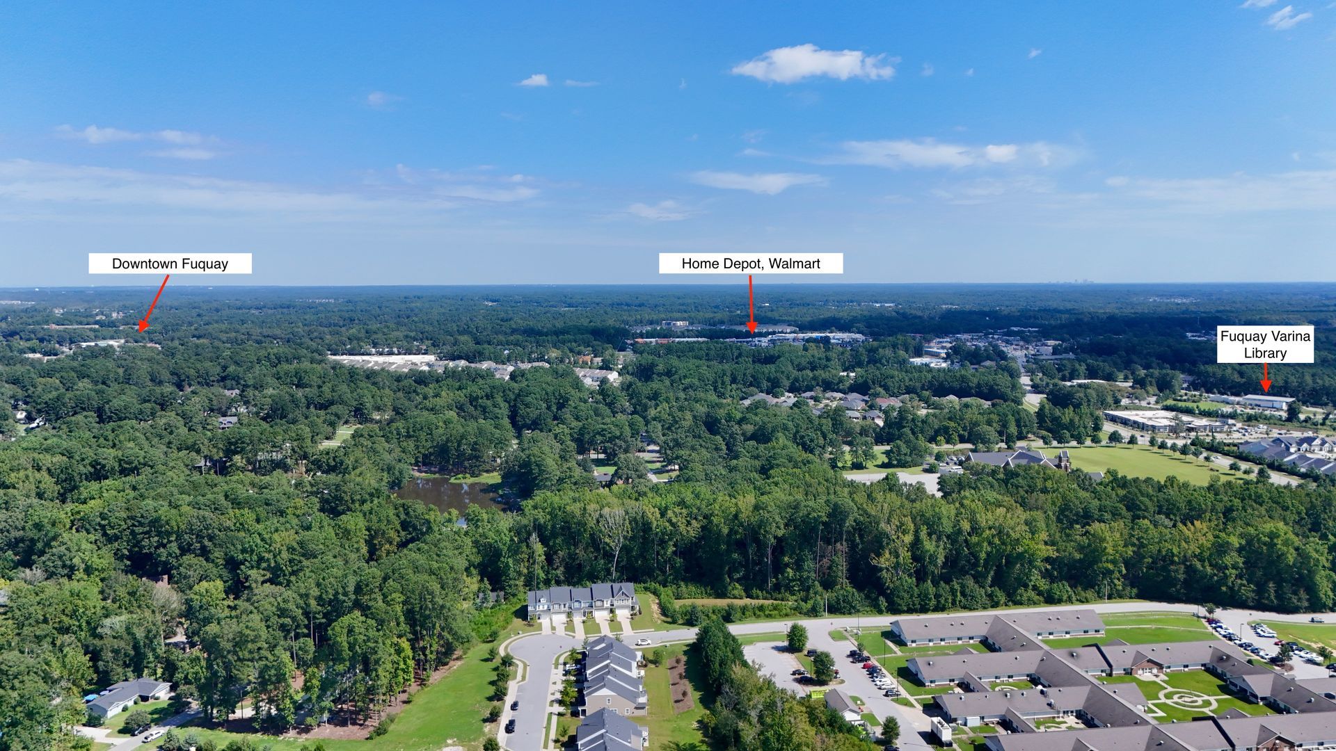 Aerial view of a town with labeled locations: 