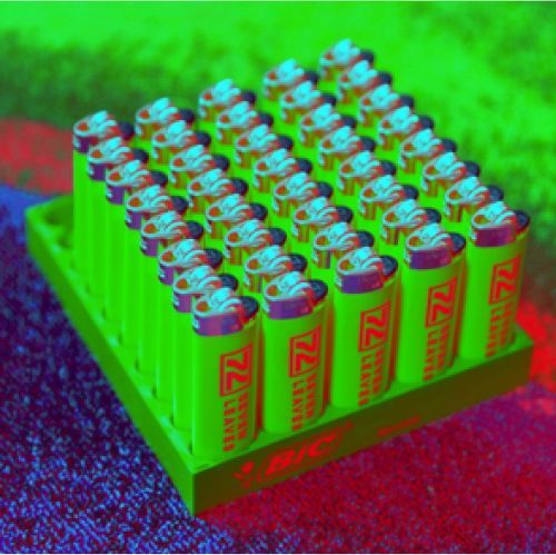 A green lighter with the words `` seven leaves '' on it.