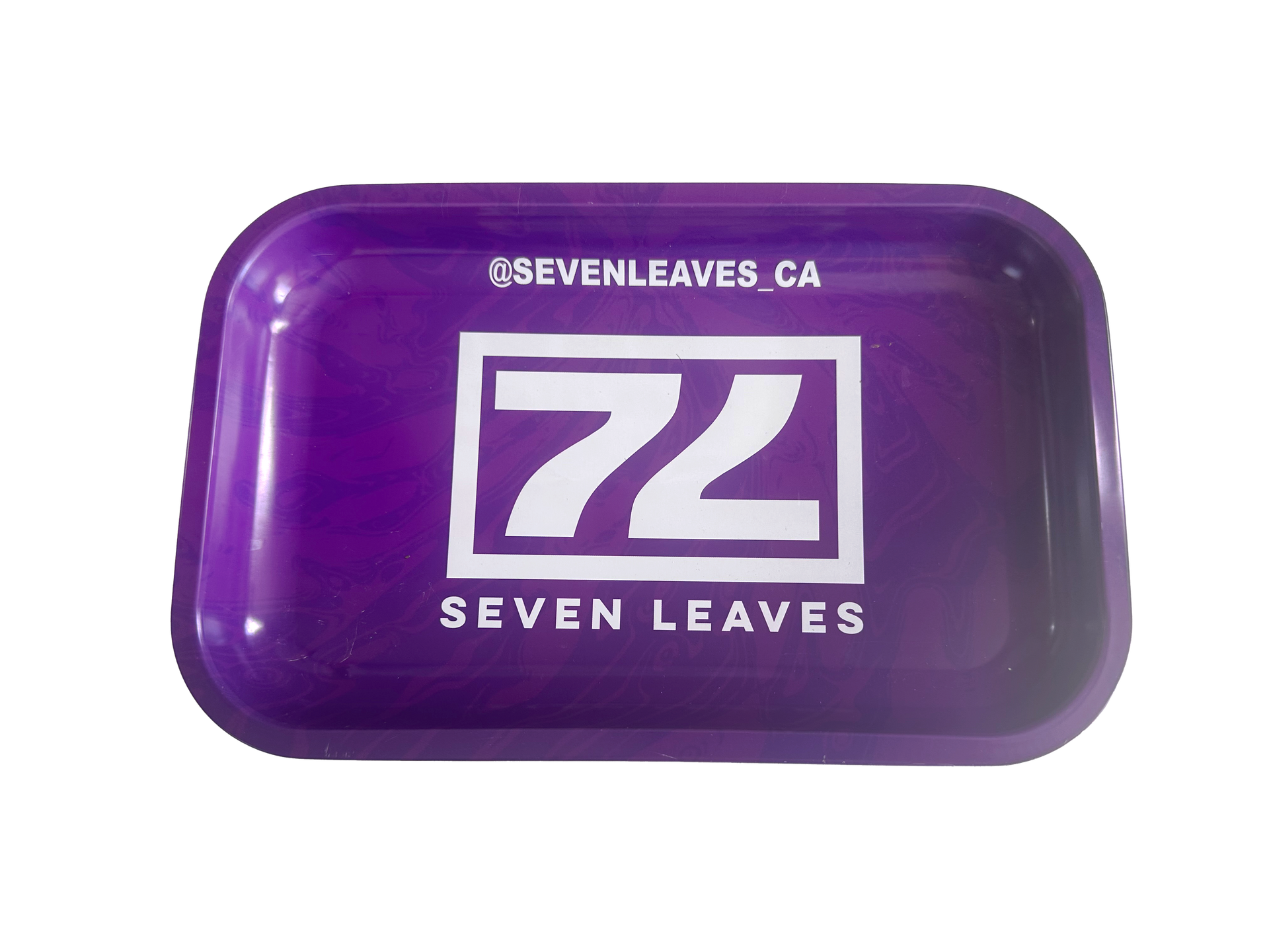 A purple tray with the seven leaves logo on it