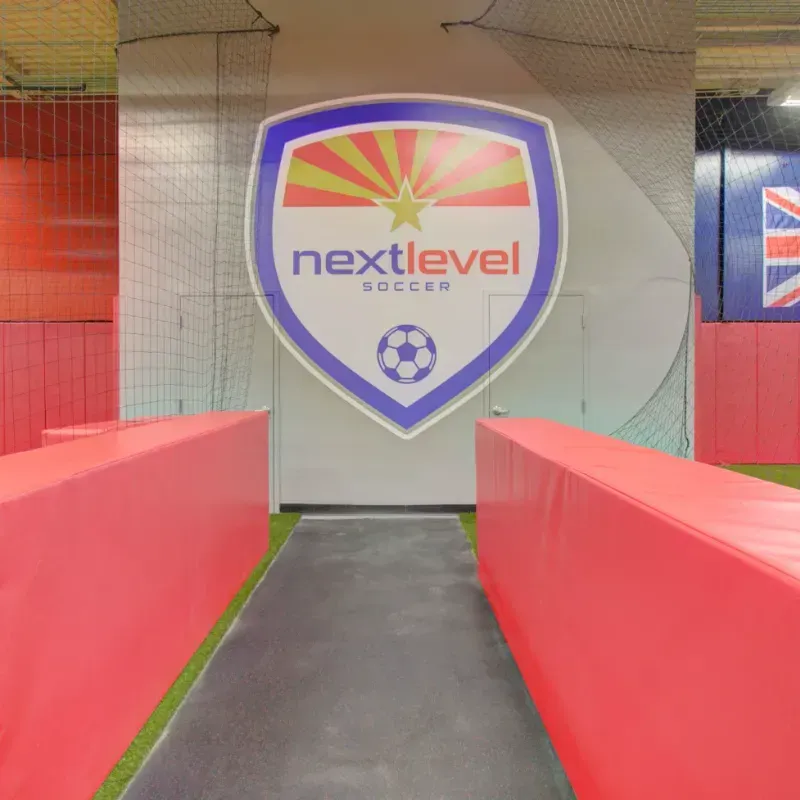 A shield with the word nextlevel soccer on it