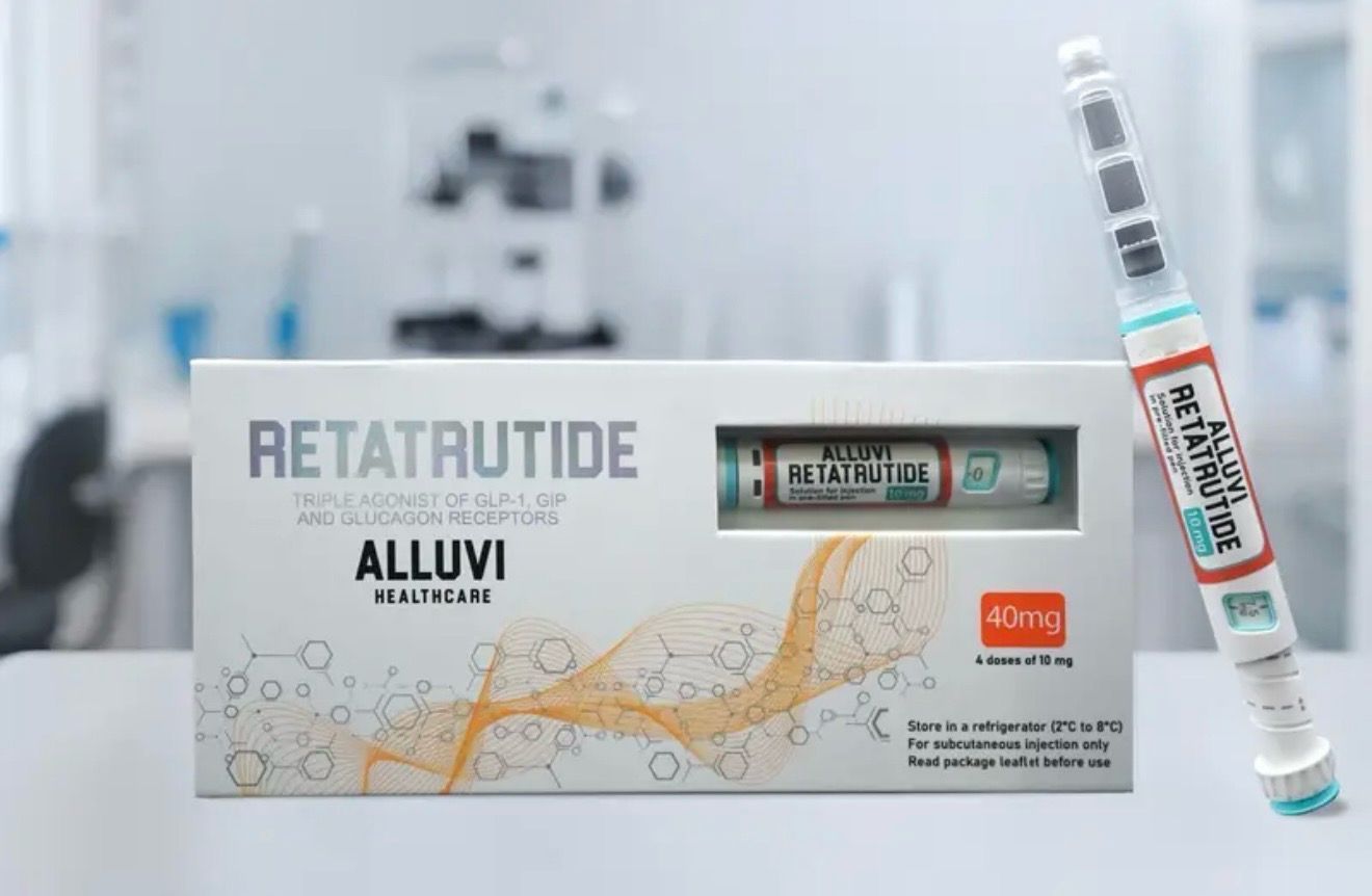 Retatrutide Alluvi medicine box and syringe on a white clinical background
