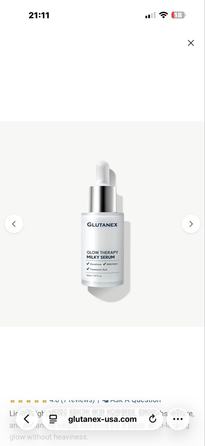 White cosmetic serum bottle with dropper on a clean white background