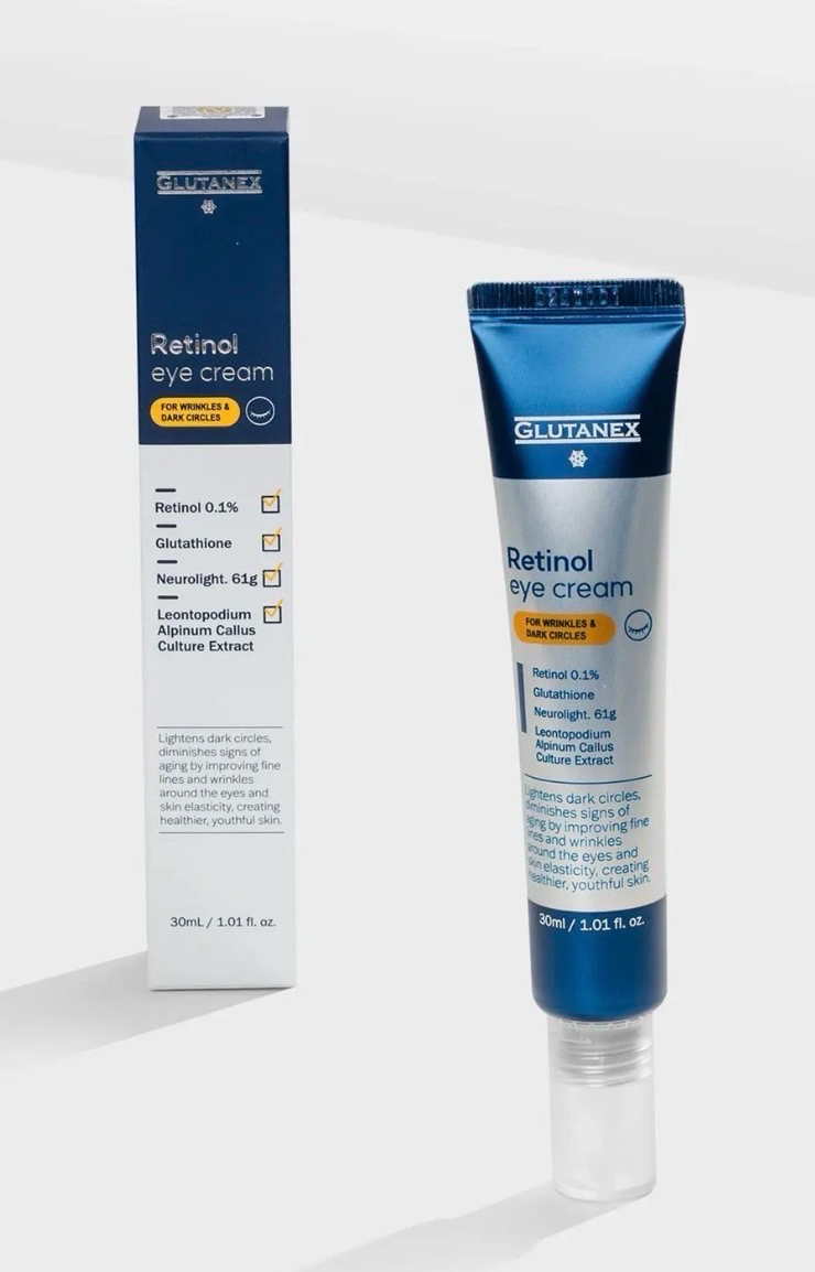 Blue-and-white Retinol cream tube and box on a white background