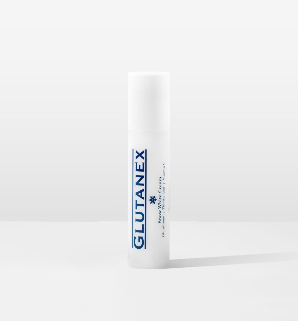 White Glutanex lip balm tube standing upright on a light background
