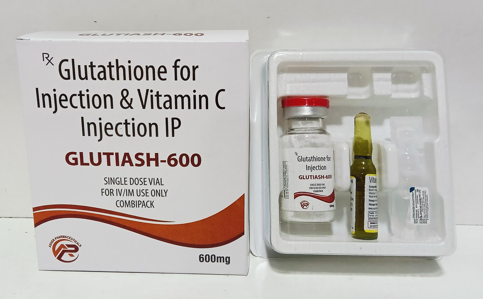 Glutathione and vitamin C injection pack with box, vial, and ampoule in a white tray
