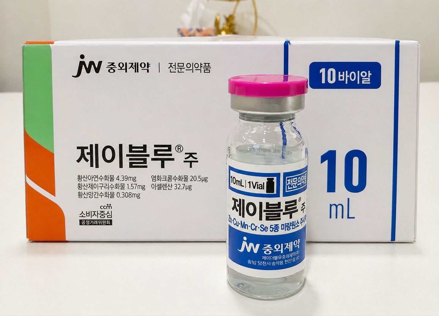 Korean medicine vial with pink cap in front of a white box labeled “10 mL” and blue text.