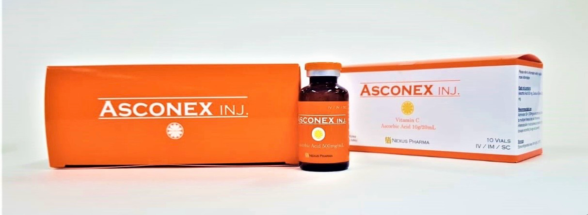 Orange Asconex XL kit with carrying case, bottle, and folded leaflet on a white background