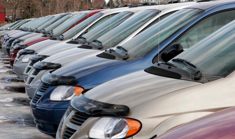 Cars in a row at a car dealership