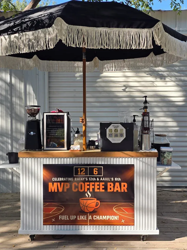 Coffee cart with black and white umbrella, 