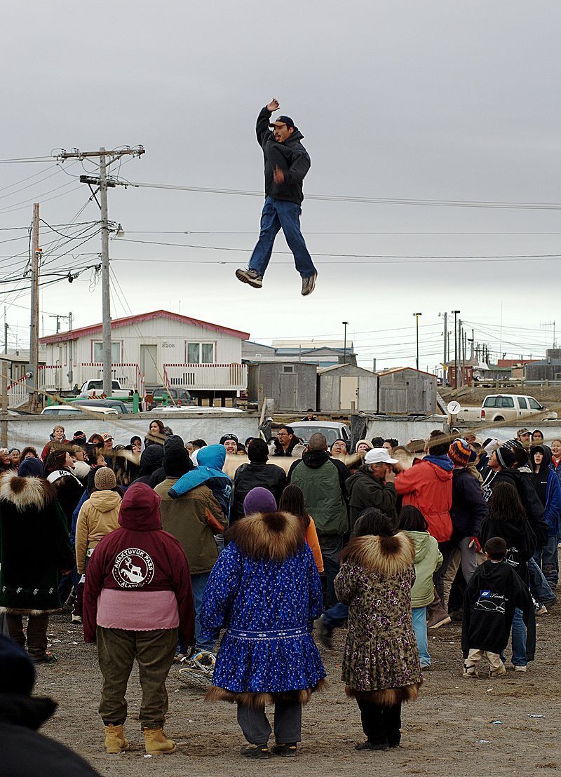 Inuit/Inuk participants playing Naluktaq blanket toss in Barrow Alaska