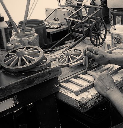 Garry Patterson in his workshop crafting Red River Cart replicas.