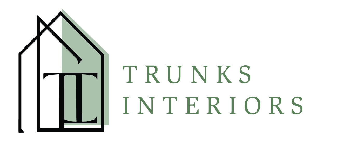 Logo for Trunks Interiors, featuring a house outline around the letters 