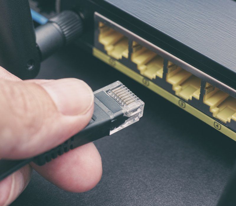 Plugging Internet Cable — Sunshine Coast, QLD — Tedlec Plugging Internet Cable — Sunshine Coast, QLD — Tedlec