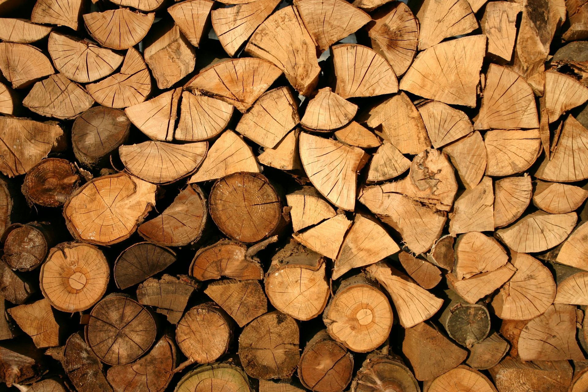 A pile of logs stacked on top of each other