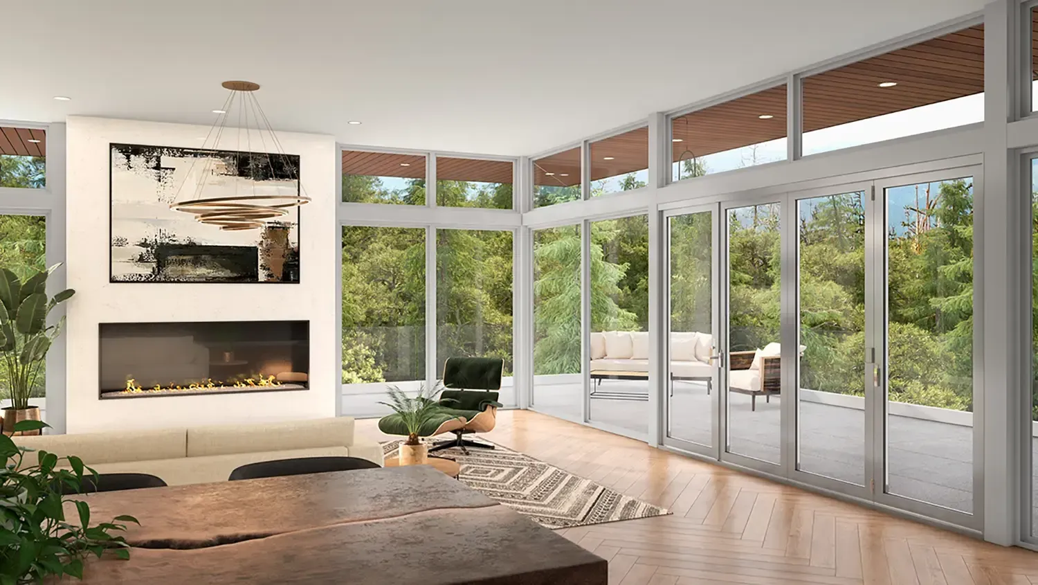 A living room with a fireplace and a lot of windows.
