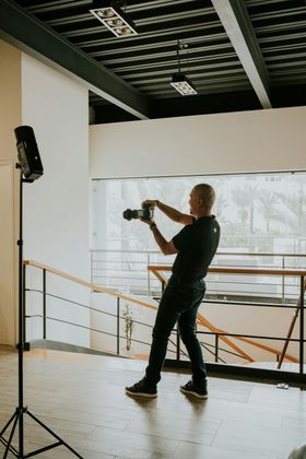 A man photographing interiors