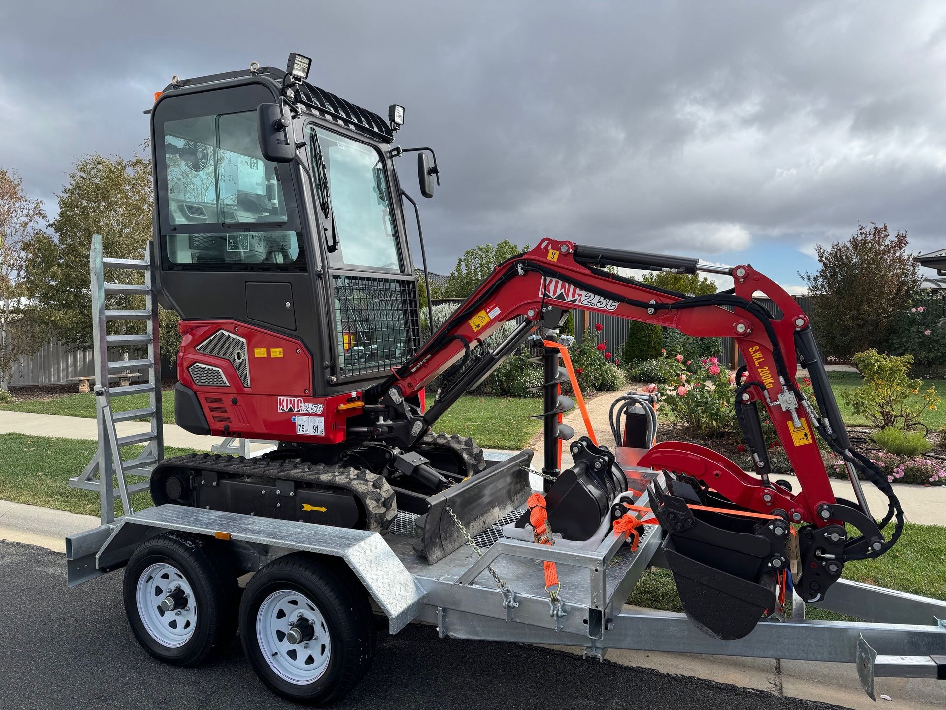 Digger King 2.5C excavator on a trailer